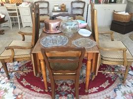 Drop leaf maple table with fomica top 6 matching French Provincial chairs and 2 arm chairs