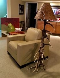 Leather chair and antler lamp