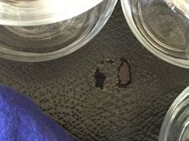 nickle size damage to top of leather chest