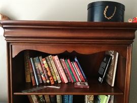 close up of top of bookcase-- all items on bookcase sold separately
