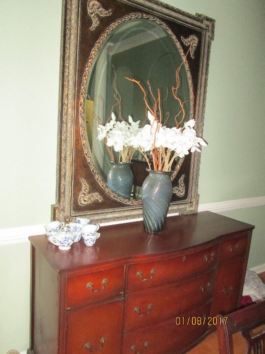 Mahogany buffet and large ornate mirror