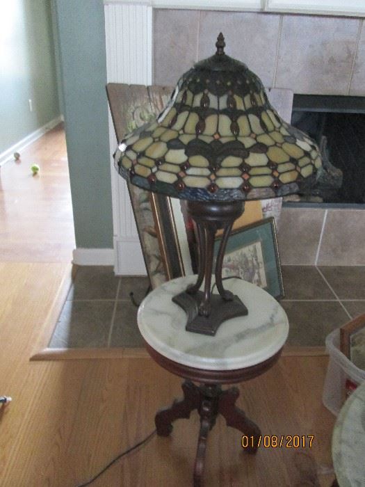 Tiffany style lamp and marble top mahogany table
