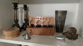 Box of scale weights. Silverplate candlesticks. Coasters.