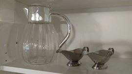 Glass pitcher with silverplate gravy boats