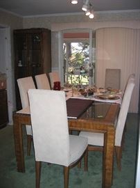 DR Table and 8 chairs - wood and smoked glass top