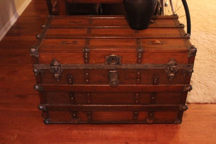wooden trunk with leather straps