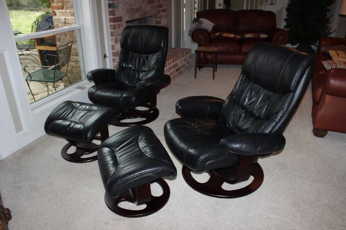 black leather chairs with footrest