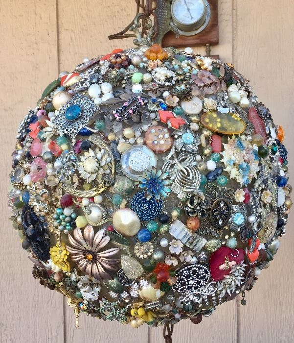 Cool one of a kind custom made jewelry hanging light. 