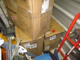 THREE SCHWINN U LOOP BIKES IN BOXES PHOTO