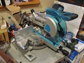 ITEM # 15   NEW COND MAKITA POWER SAW RETAIL $250.00   BUY IT NOW PRICE $125.00