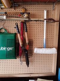 garden tools some still in shed in back