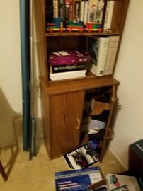 book rack stuffed with software and computer books