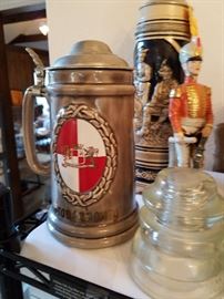 german steins and old telephone pole glass conductor (I am sure this saved many lives on the line)