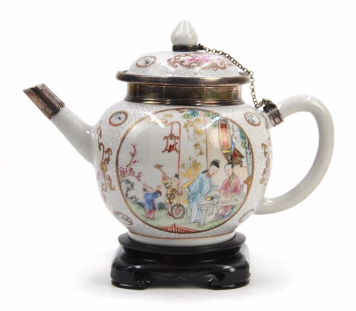 A FAMILLE ROSE ENAMELED PORCELAIN TEAPOT WITH SILVER MOUNTS,QING DYNASTY(1644-1912) Property from an Arizona Collection
