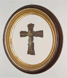 RELIC INSIDE OF OVAL FRAME