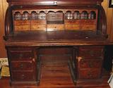 ANTIQUE 19TH CENTURY FLAME MAHOGANY AND BIRD'S EYE MAPLE KNEEHOLE ROLL TOP DESK