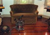 ANTIQUE TAUPE VELVET SETTEE AND ANTIQUE FILTER QUEEN VACUUM CLEANER WITH ATTACHMENTS