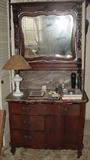 ANTIQUE MID VICTORIAN FLAME MAHOGANY SERPENTINE SINGLE DRESSER WITH ORNATE CARVED MIRROR AND RED MARBLE TOP - MATCHES ONE IN THE OTHER ROOM