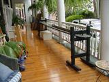 THE VERANDA OFF OF THE MAIN FLOOR AND THE JOGGLING BOARD
