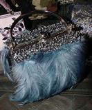 FEATHERS AND RHINESTONES