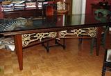 INCREDIBLE GILT CARVED OPEN WORK STRETCHER TABLE WITH MID CENTURY LEGS AND CARVED DOOR TOP WITH GLASS