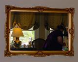 ARTICULATED GILT WOOD LARGE FRAMED MIRROR