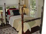 THERE ARE 3- FOUR POSTER BEDS IN THIS HOUSE, THIS ONE IS AN ANTIQUE CHERRY WITH GREAT MATELASSE LINENS