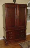 SOLID CHERRY ENTERTAINMENT AND CONTAINS A FLATSCREEN TV