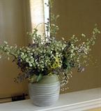 MANY GREAT CROCHERY PIECES WITH SILK FLOWERS