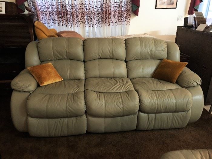 2 Full Size Leather Reclining Sofas, and a Matching Leather Recliner