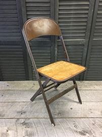 1 industrial antique wood and metal folding chair manufactured by the Clarin Mfg. Co. The tag on chair reads ? Clarin Mfg. Co., Chicago Ill. Glides on legs are in tact and in great condition, folds up perfectly. Overall in fantastic vintage industrial condition with scratches minor dings for that fantastic distressed look!