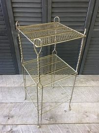 Atomic Era, Brutalist style, gold metal telephone stand, Measures approximately 28 inches tall. Estimated value $98.00.