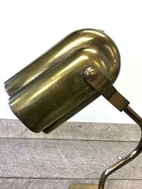 Machine era, Streamlined, art Deco copper tone metal lamp. Measures approximately, this lamp will need to be wired. Est Value $650.00 and up.