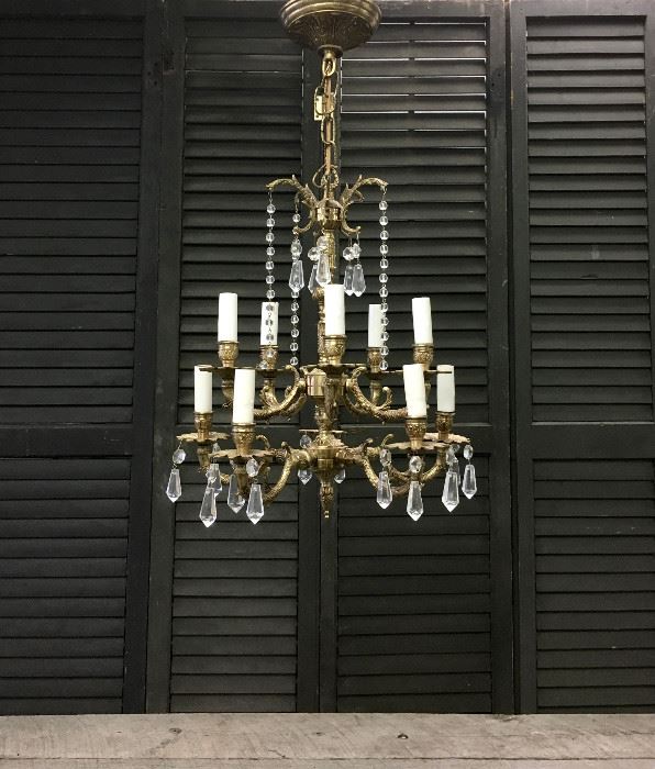 Small late 19th century, early 20th century, antique Spanish brass chandelier. Measures approx. All sockets work perfectly. Chandelier measures approximately 18 inches Long x 15 inches in diameter. Estimated value $ 300.00.
