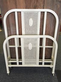 Antique 1890s twin sized metal headboard and footboard with metal side rails.