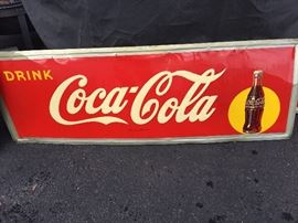  Coke signs are 54 inches in length and 14 inches in width. 