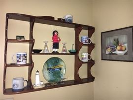 Beautiful handcrafted cherry wall display shelf.