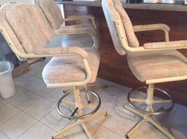 Three upholstered bar stools