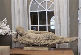 MONUMENTAL CARVED CORAL STONE RECLINING BUDDHA, 65" LONG