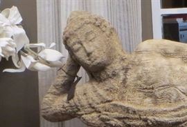 MONUMENTAL CARVED CORAL STONE RECLINING BUDDHA, 65" LONG