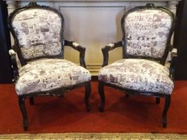 PAIR LOUIS XV STYLE ARMCHAIRS WITH CARTOON PRINT ON LEATHER UPHOLSTERY, DONALD DUCK COMIC STRIP IN FRENCH, ENGLISH, GERMAN, WITH BLACK FINISH CARVED WOOD FRAME