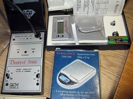 various meters for testing and weighing jewelry