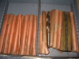 dozens of huge drill bits