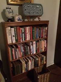 Some of the many books; book shelf; blue & white items