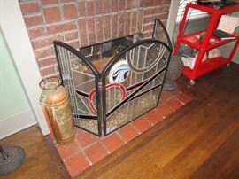 Stained glass fireplace screen by local artist Joey Williams