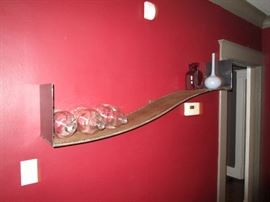 Curved steel shelf