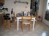 Kitchen table with 4 chairs.
3 matching barstools