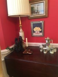Drop leaf table; on right, chocolate set