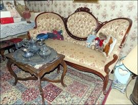 Victorian Sofa and Tea Table with Tea Set.