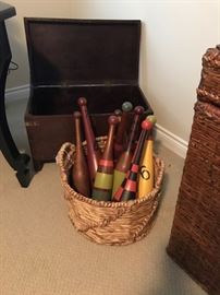 Indian Clubs, Lift-top chest in corner